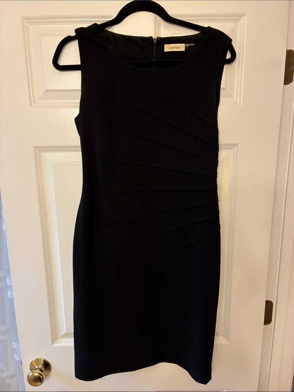 Calvin Klein Black Sleeveless Sheath with Diagonal Panel Accents - size 6